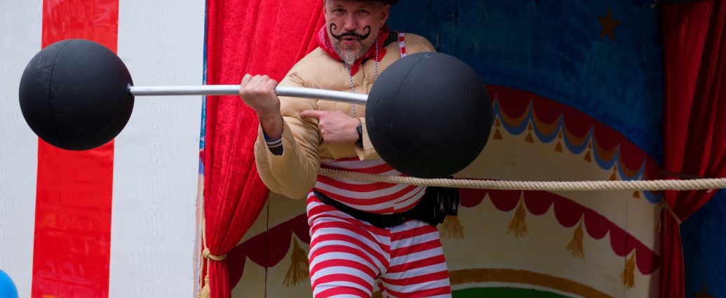 weight-lifter at a carnival
